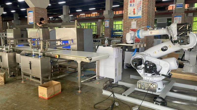 ذراع روبوتية لإزالة الغطاء