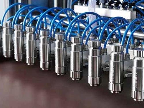 ماكينة رش عامل مانع التصاق المخبوزات